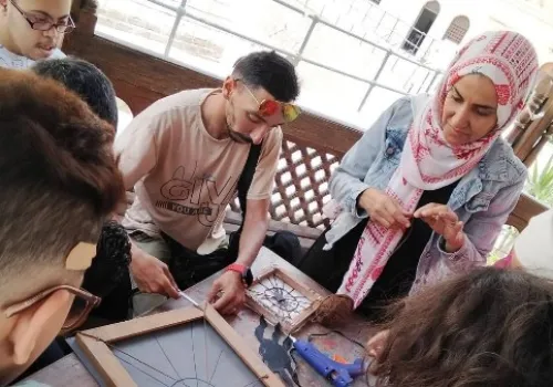 ورشة فنية مبدعة بالمتحف القبطي تحتفي برأس السنة الهجرية برموز الغار والحمامة والعنكبوت